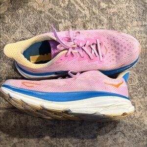 Hoka Women’s Pink Running Shoes with Blue and Yellow Accents